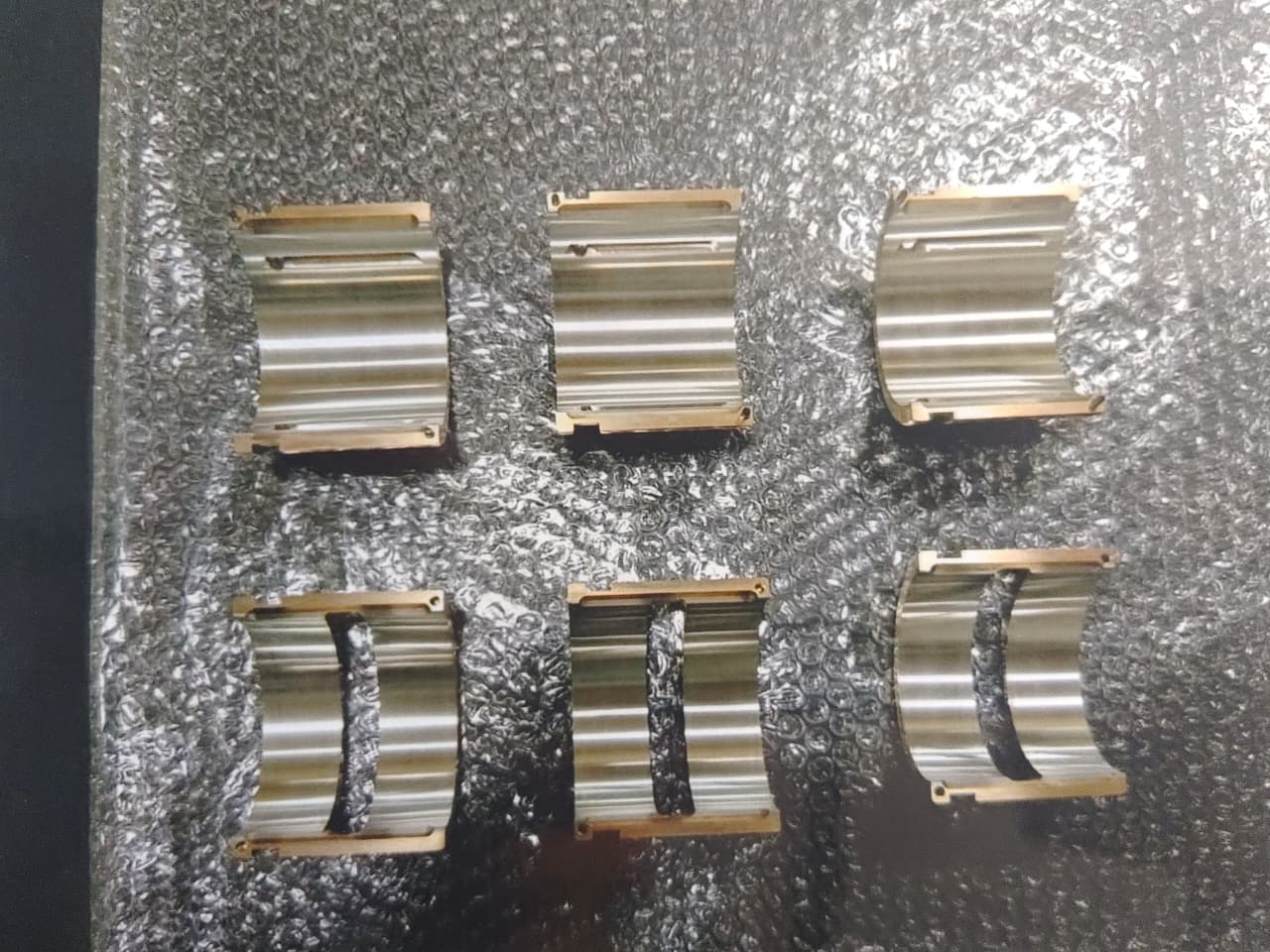 Curved bearing liner segments